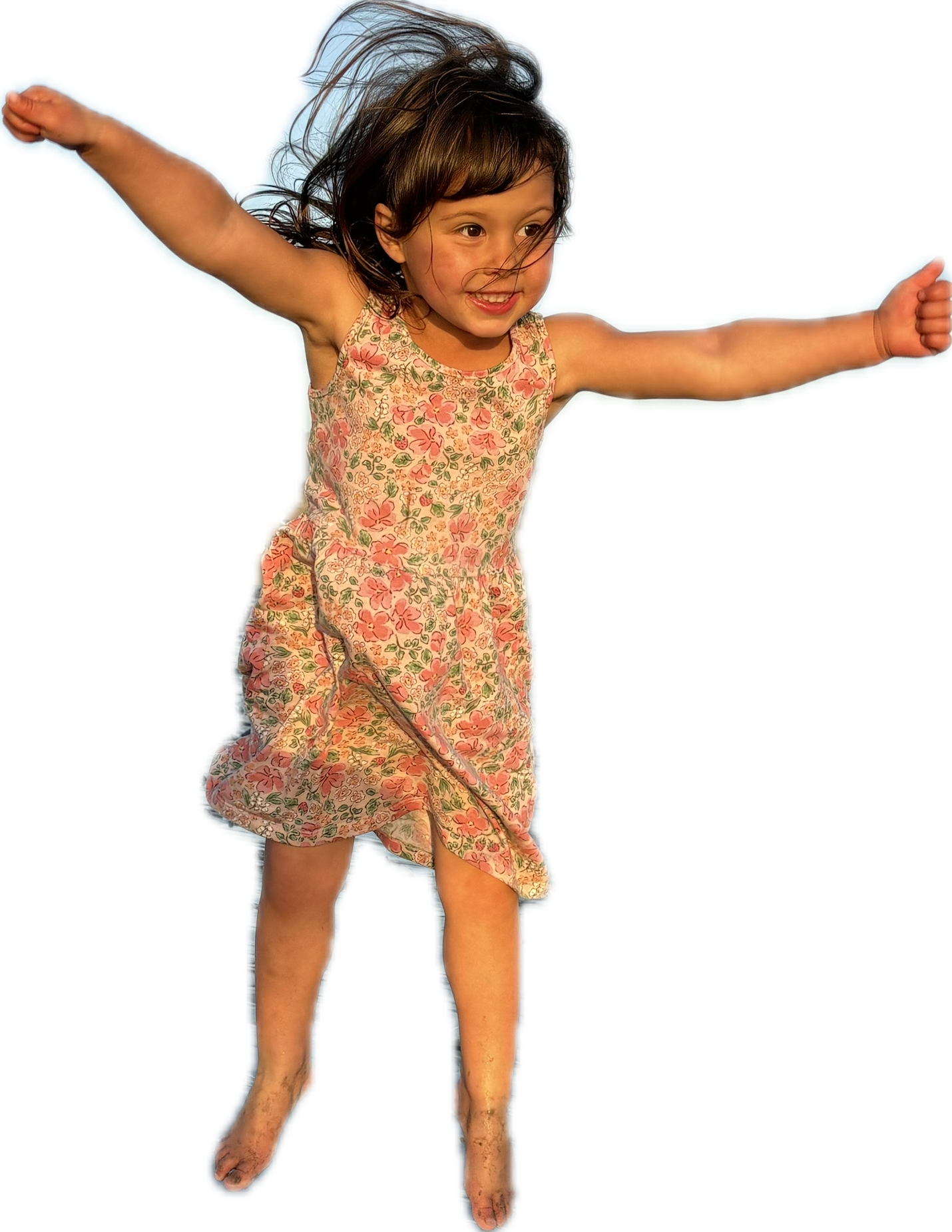 Livi jumping with her arms stretched out